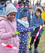 Foto: Das Absperrband wird von den Kindern durchschnitten.