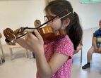 PhilMobil | Kind an der Geige