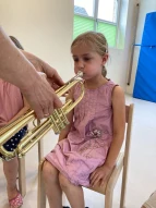 PhilMobil | Kind an der Trompete